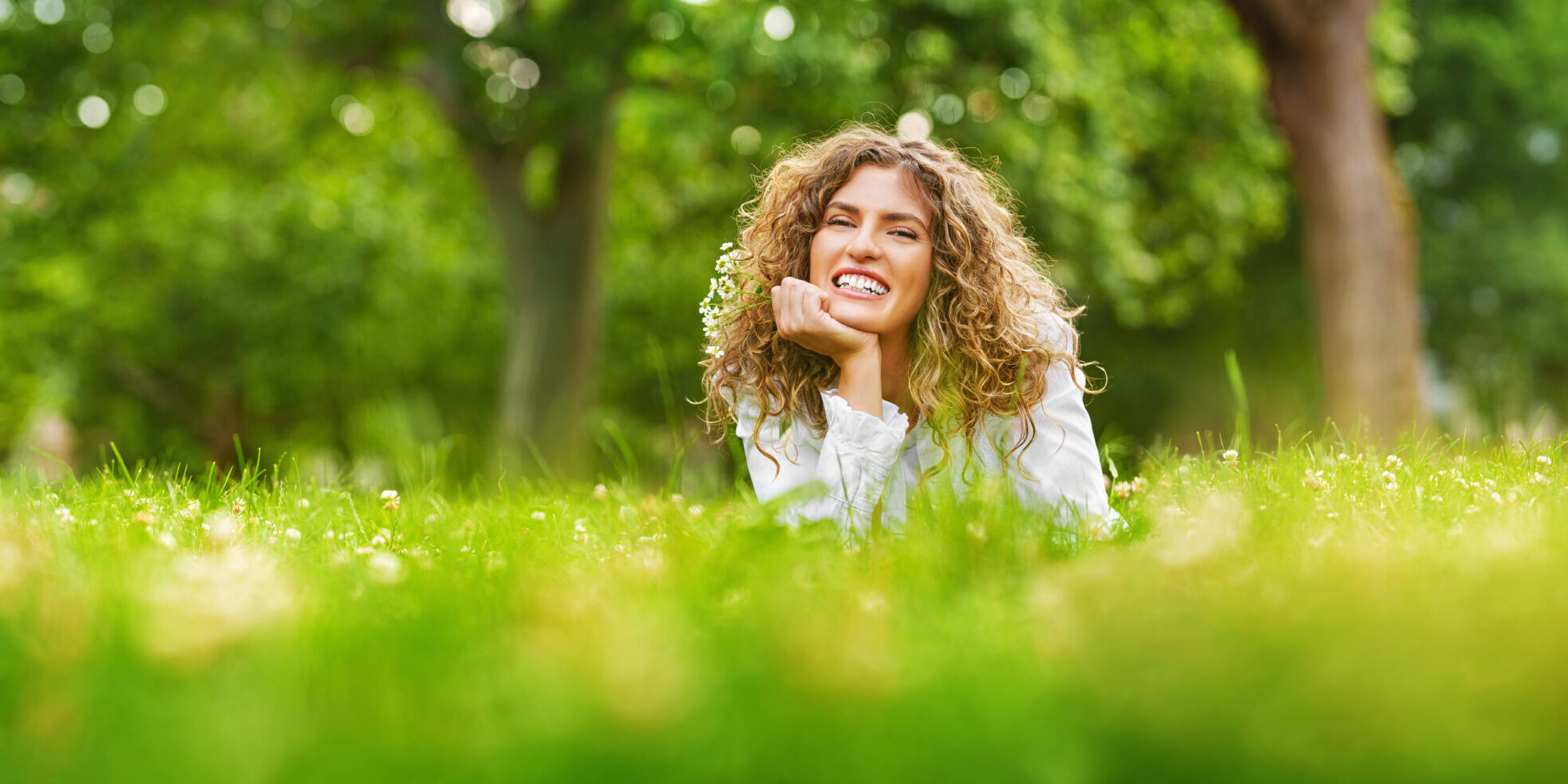 Pretty smiling girl relaxing outdoor