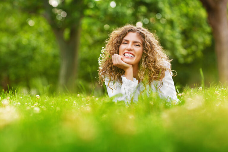 Pretty smiling girl relaxing outdoor